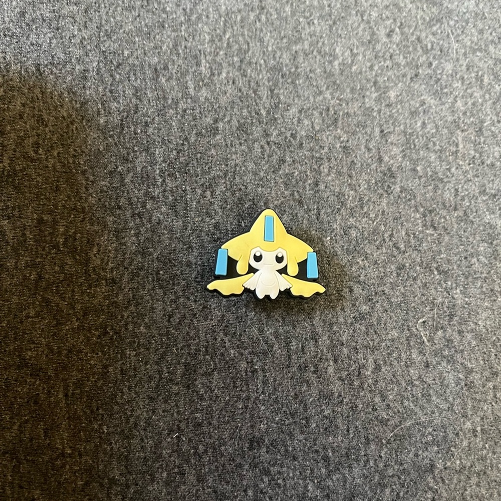Pokémon Jirachi Croc Charm never used!

(Bundle for a lower price)